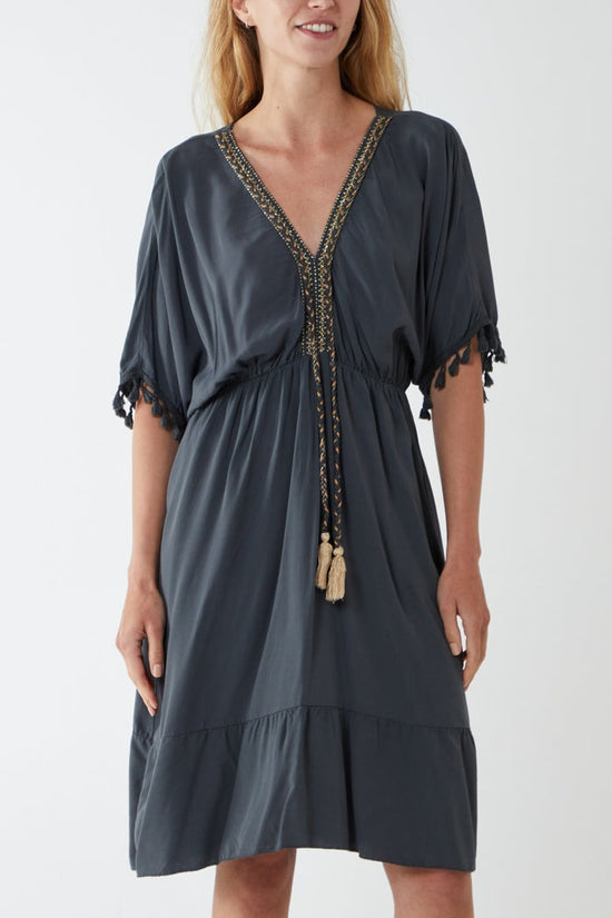 Load image into Gallery viewer, Eleanor Elasticated Detail Tassel Trim Dress Dark Grey
